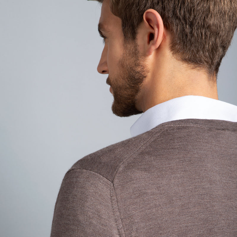 Extra Fine Merino Wool V-Neck in Hazelnut, detail of shoulder on model – FILOFINO Luxury Italian Knitwear